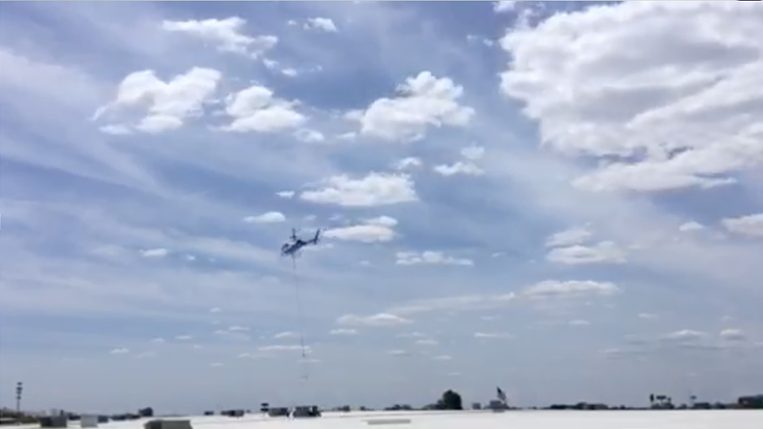 Helicopter Lift Service: Installing 34 One Ton A/C Units in Just 2 Hours