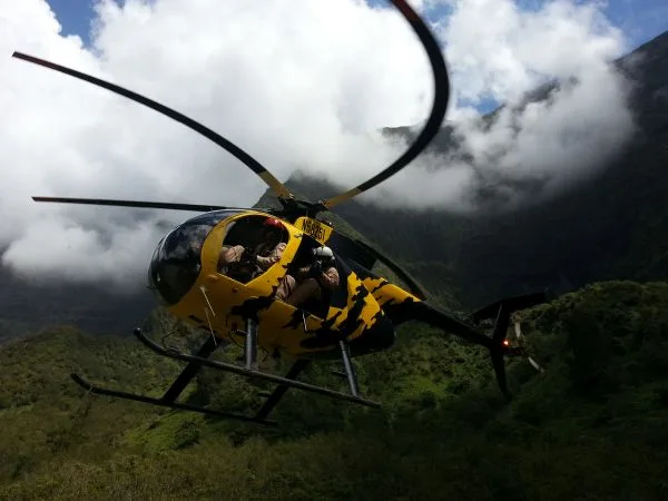 James Leary in a Helicopter with his Herbicide Ballistic Technology.