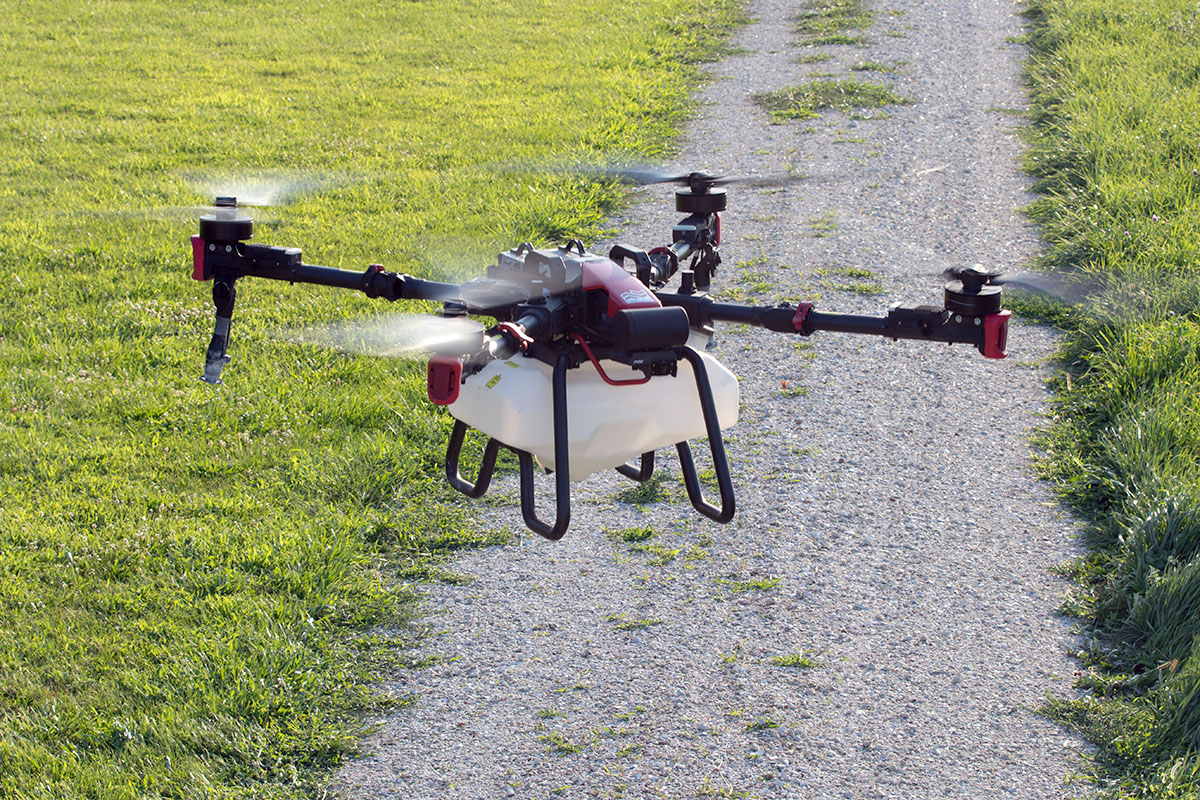 A Fair Lifts XAG P100 Pro Taking off on a Greenhouse Coating Mission.