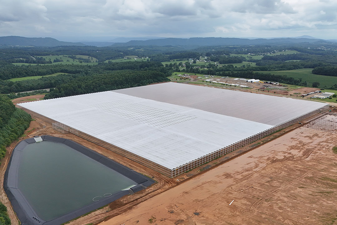 Mid-project phase, with ReduSol applied to an estimated 50% of the roof surface.