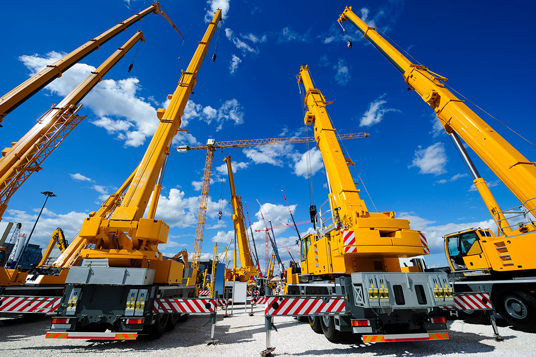 Several ground cranes awaiting deployment.