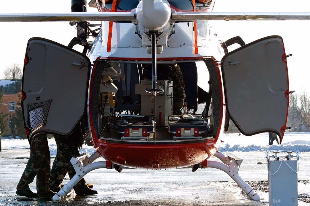 Open clamshell doors of an EC145 | Photo: Igor Bubin