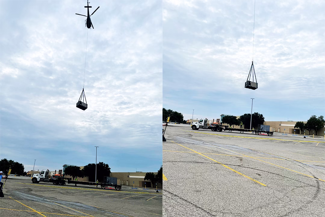 The "Astar" lifts an HVAC unit to the be placed on the rooftop.