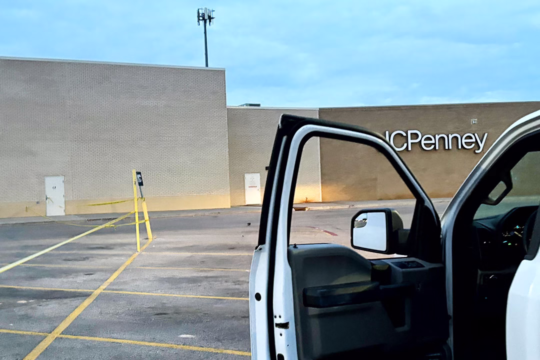 A view of the building structure and staging area for the HVAC rooftop unit helicopter lift.