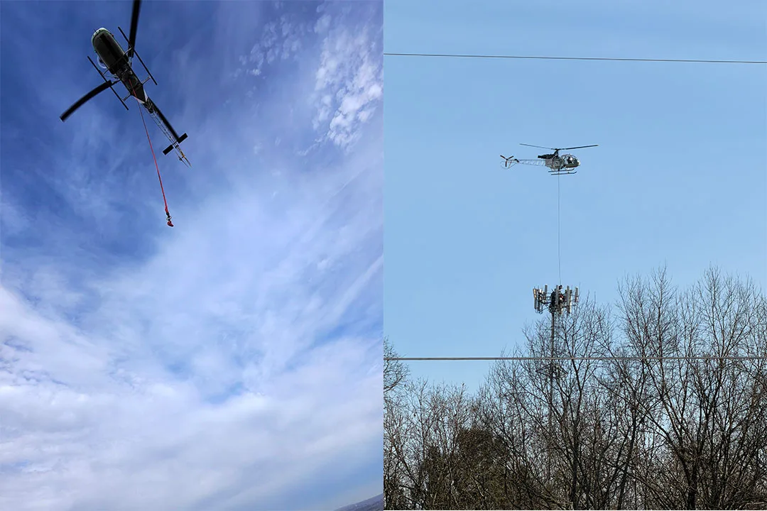 The SA 315B Lama hovers steadily while transporting tower mounted antenna assemblies to the Mount Swap telecom site, showcasing controlled long line lift operations over rural Alabama terrain.