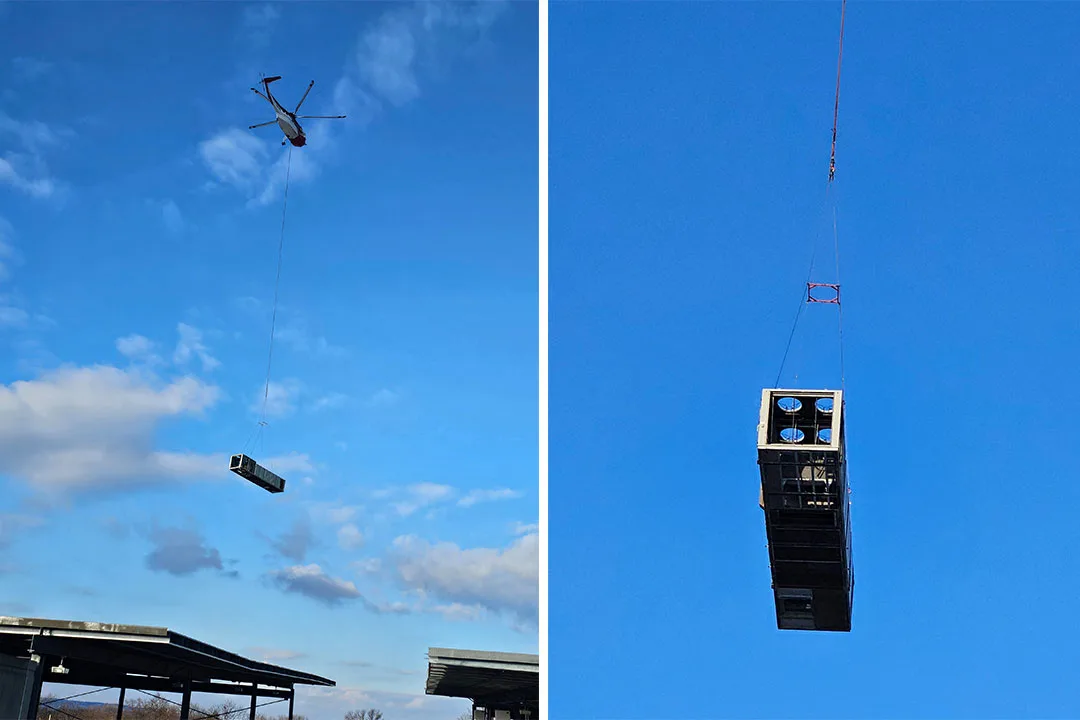 Two views of a Sikorsky S-61N in flight transporting a 7,400-pound commercial HVAC unit via long-line cable.