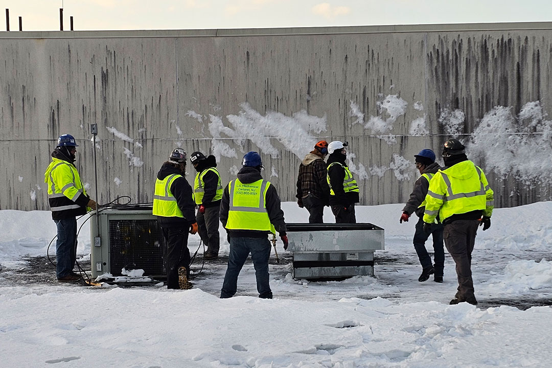 Featured image for “From Rooftop Removal to Replacement: Helicopter HVAC RTU Lift in Action”